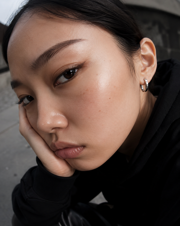 Single Hoop Earring in silver with lab-grown diamond, worn — Plain Form
