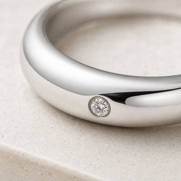 Dome Ring in silver with flush-set lab-grown diamond — angled view