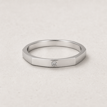 Hex Ring in silver with lab-grown diamond and faceted hexagonal edge — studio