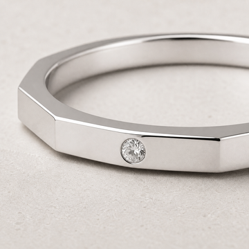 Hex Ring in silver with faceted hexagonal edge — angled view